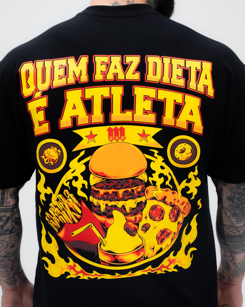 Camiseta <strong>Oversized Treino</strong> Mith Quem Faz Dieta é Atleta Preto