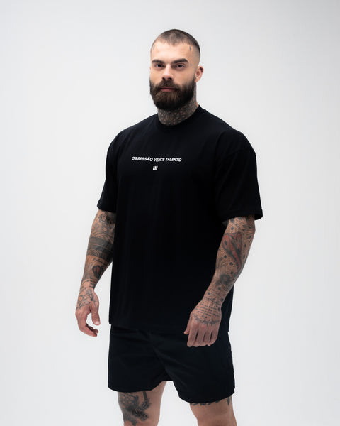 Camiseta <strong>Oversized Treino</strong> Preta Mith Obsessão Vence Talento