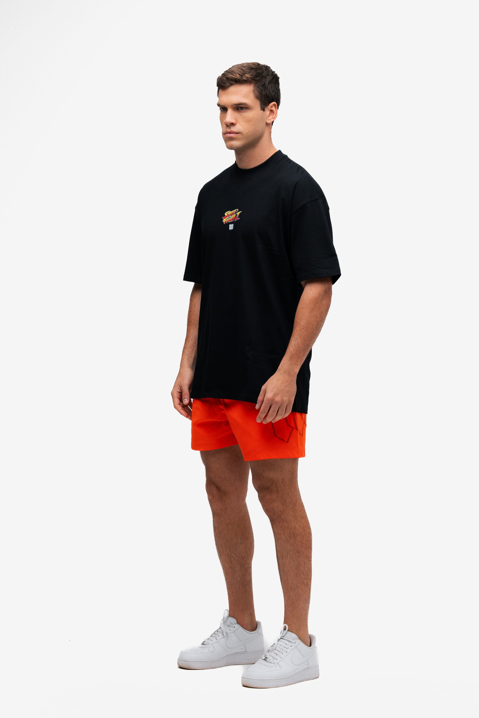 Camiseta Oversized Street Fighter Car Stage Bonus Preto