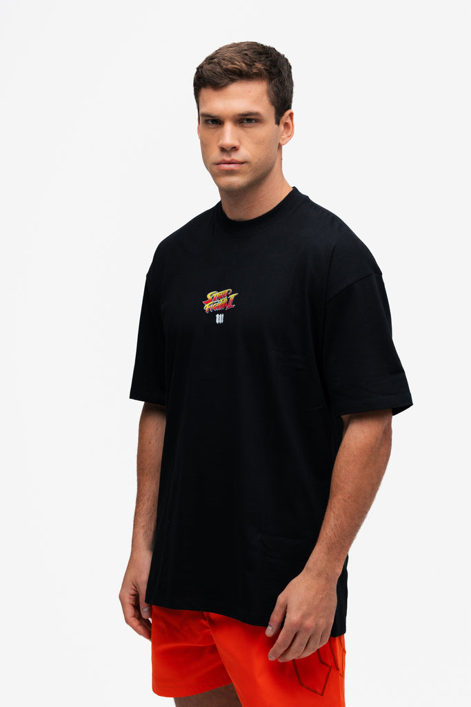 Camiseta Oversized Street Fighter Car Stage Bonus Preto