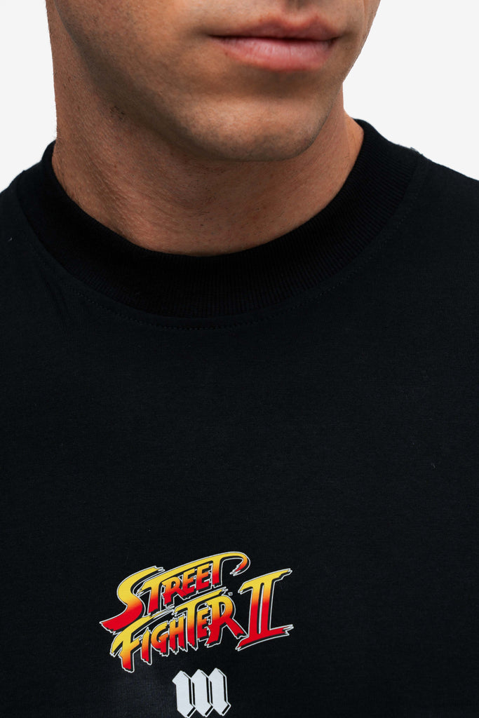 Camiseta Oversized Street Fighter Car Stage Bonus Preto