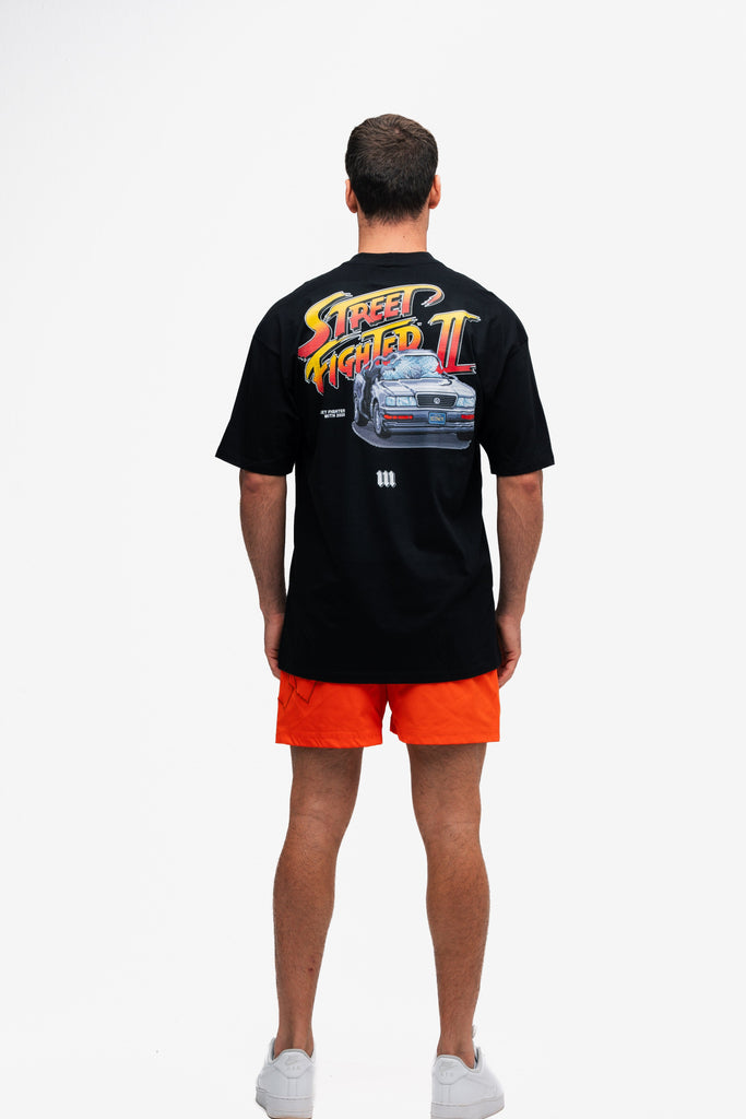 Camiseta Oversized Street Fighter Car Stage Bonus Preto