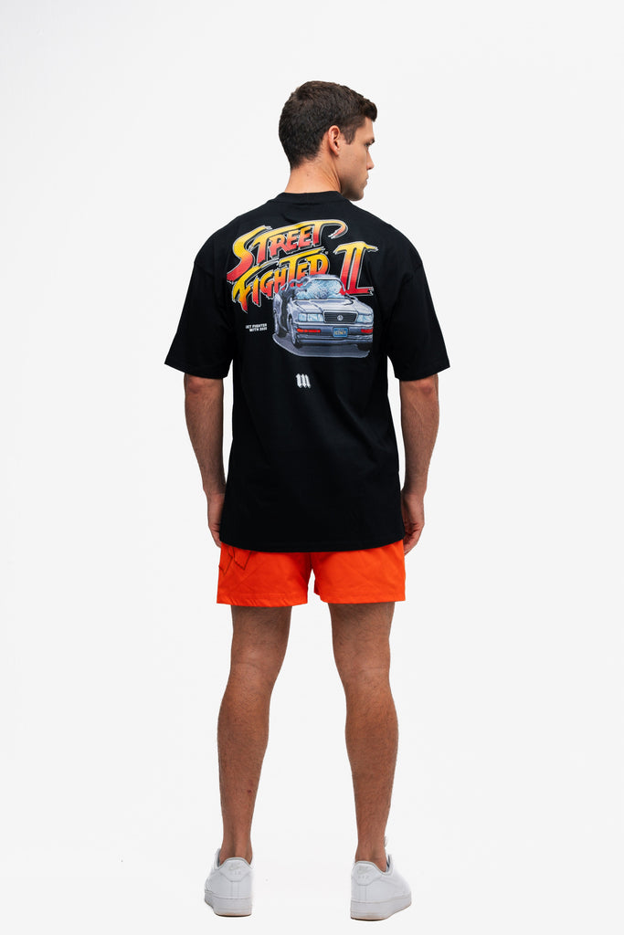 Camiseta Oversized Street Fighter Car Stage Bonus Preto