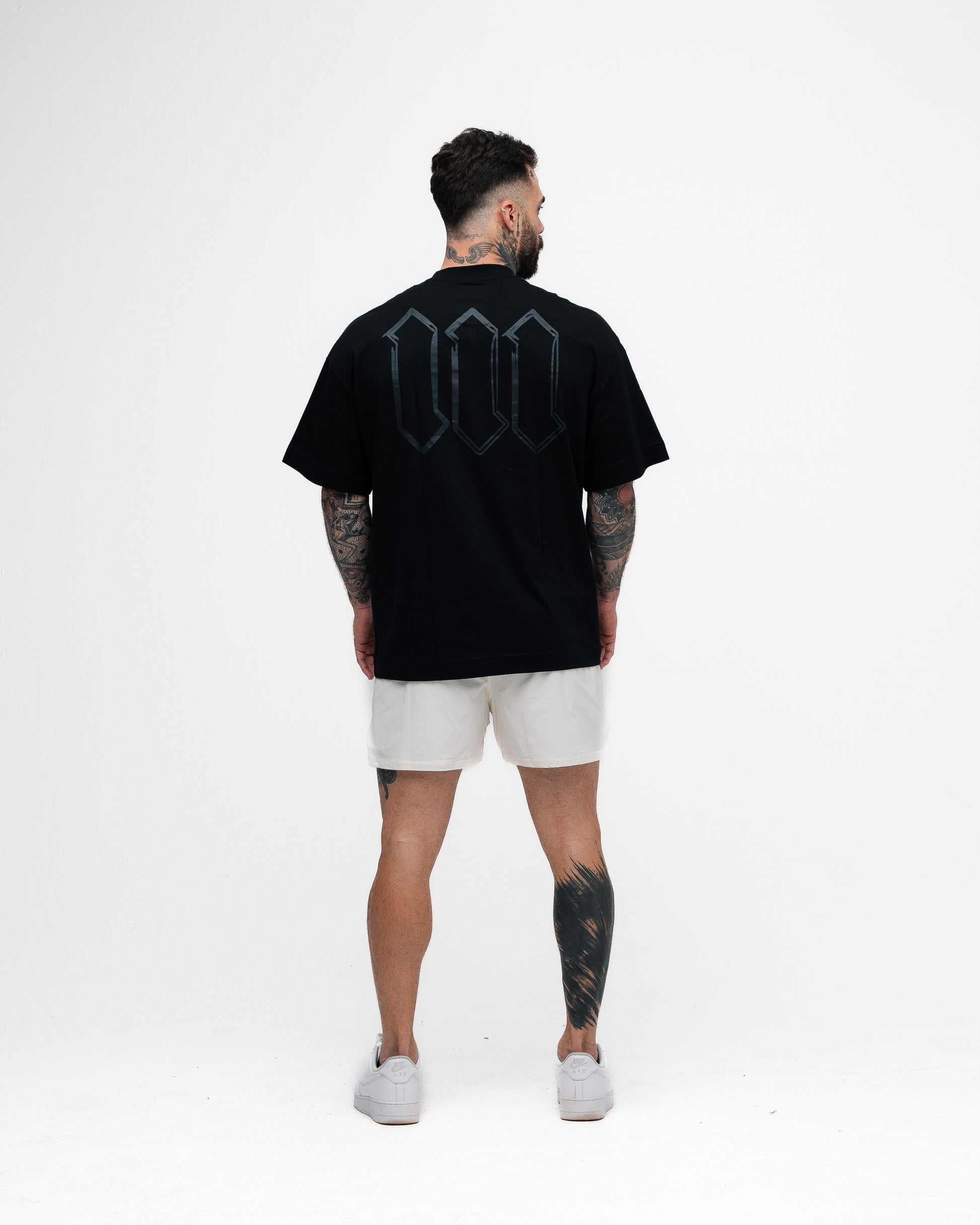 Camiseta Oversized Mith Nation Graphic Doodle Preto