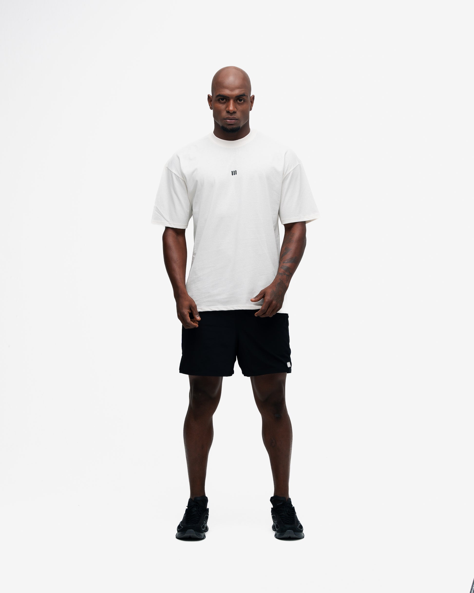 Camiseta Oversized Mith Nation Training Club Off White