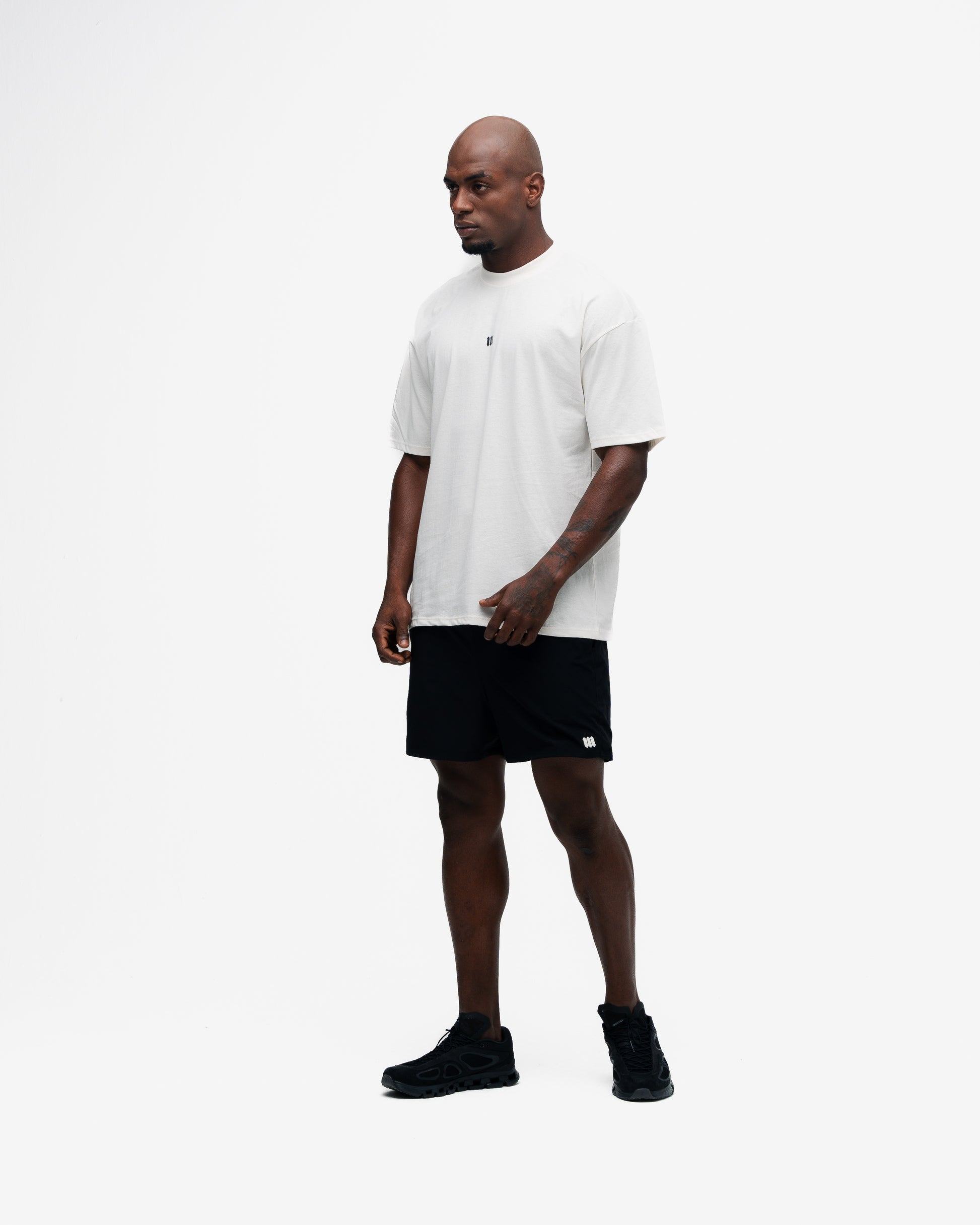 Camiseta Oversized Mith Nation Training Club Off White