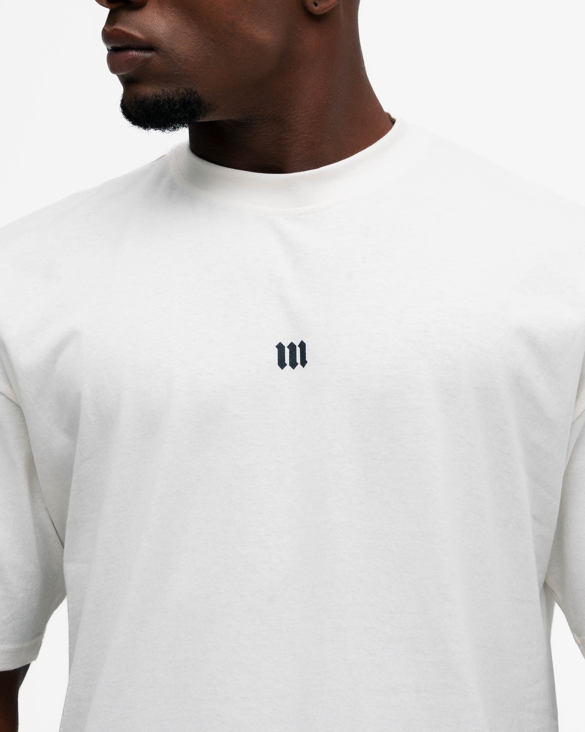 Camiseta Oversized Mith Nation Training Club Off White