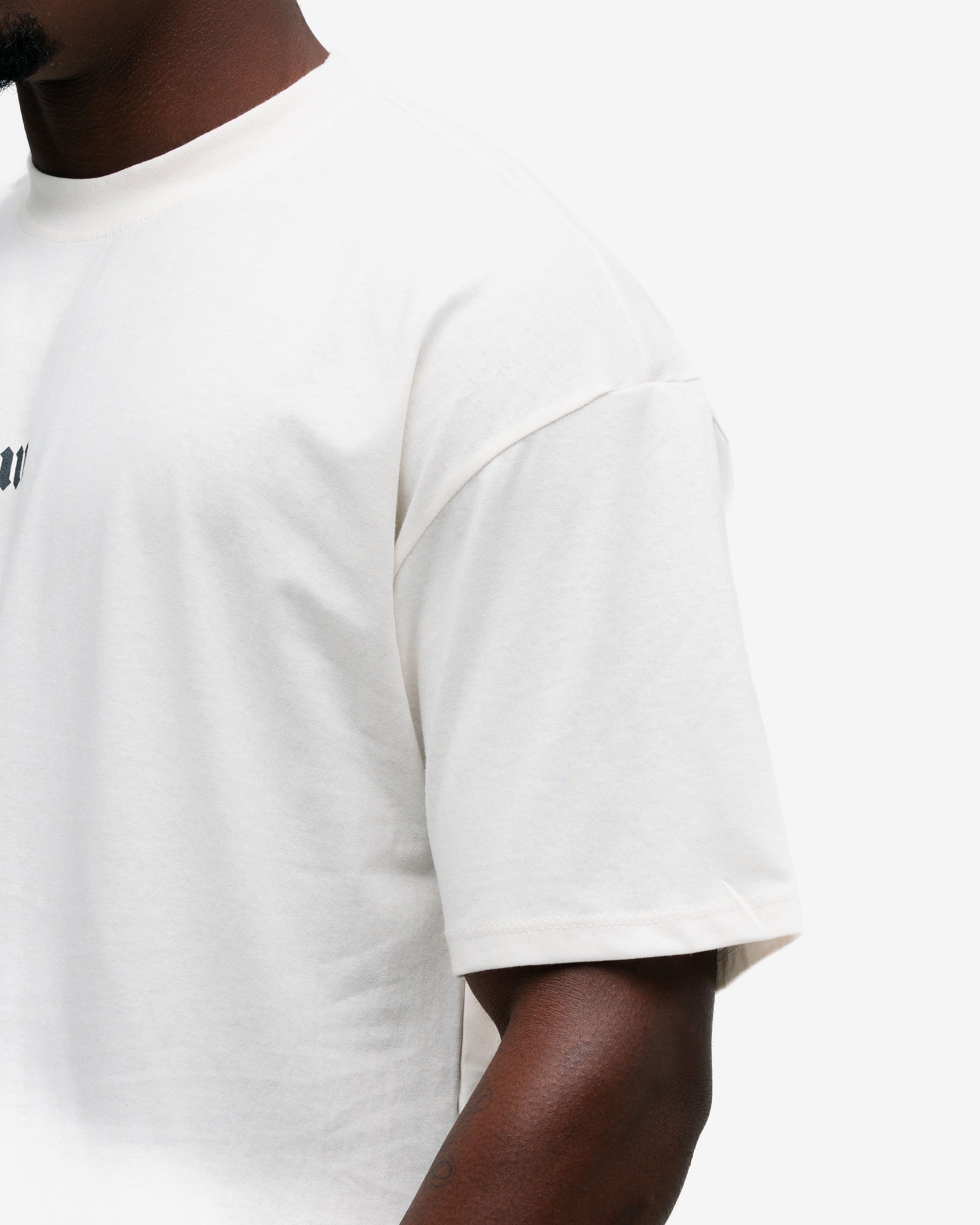 Camiseta Oversized Mith Nation Training Club Off White