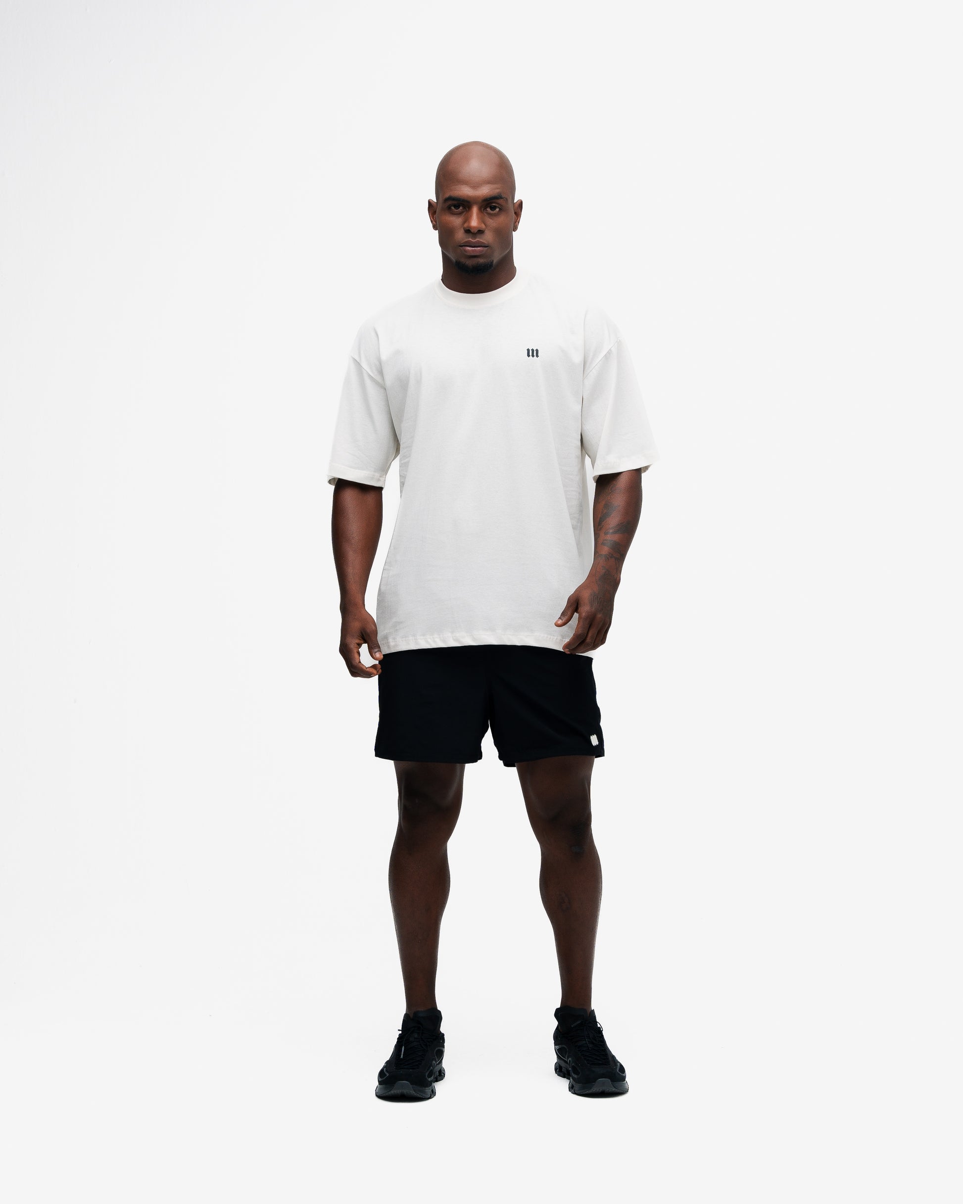 Camiseta Oversized Mith Nation Training Club Off White