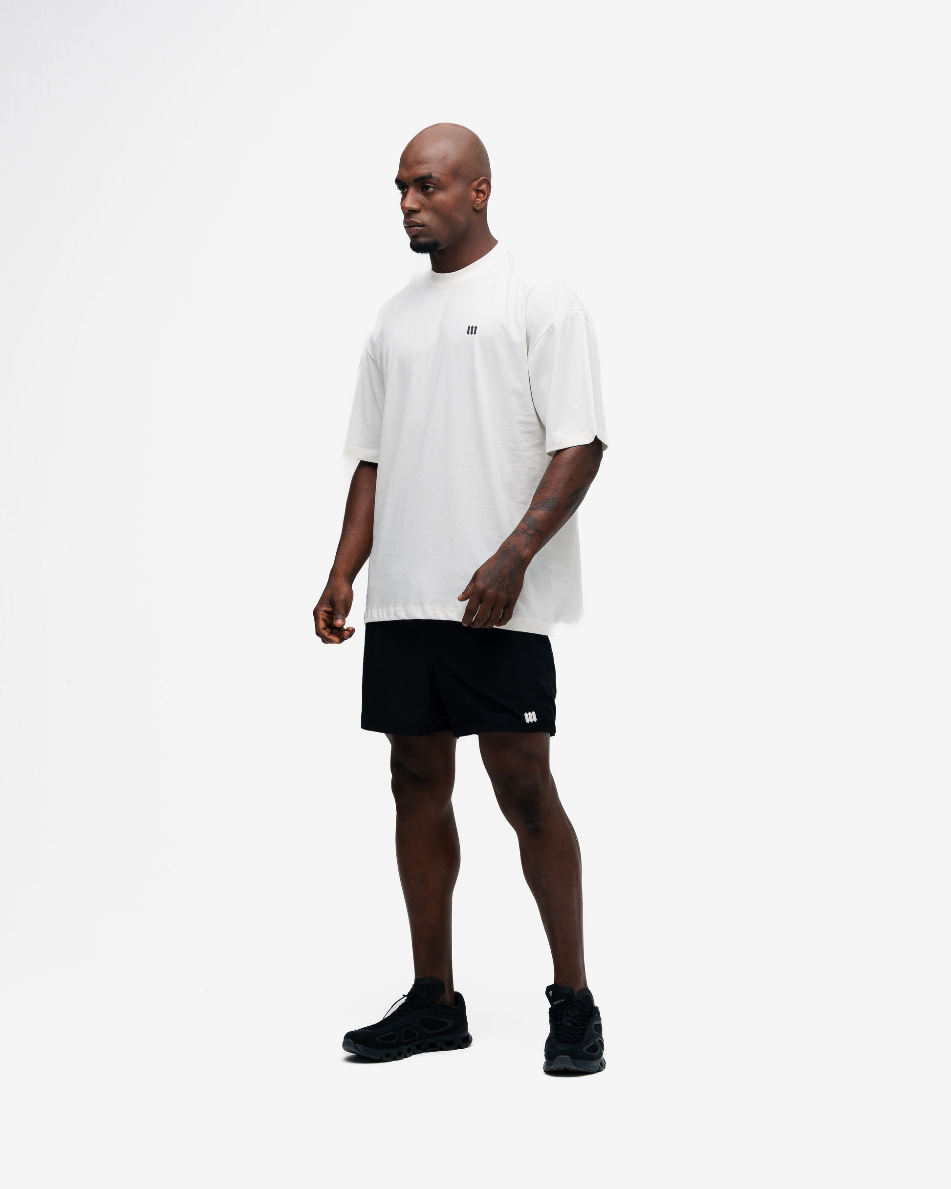 Camiseta Oversized Mith Nation Training Club Off White