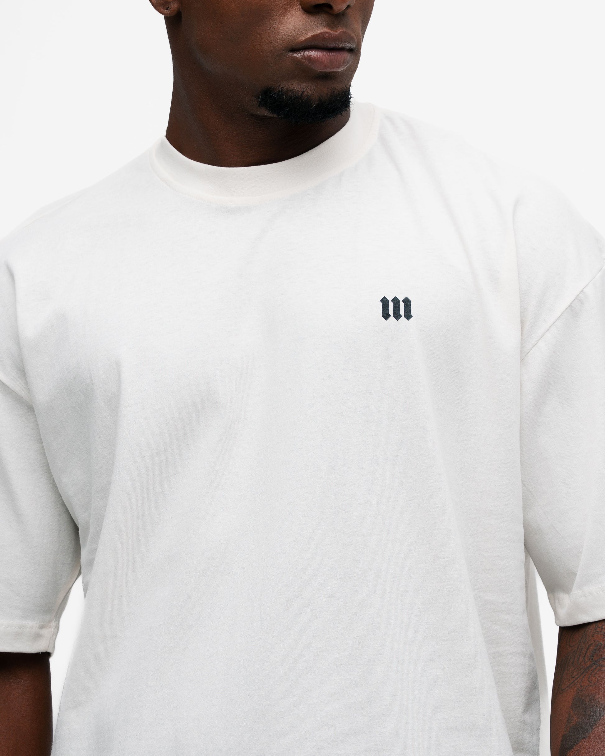 Camiseta Oversized Mith Nation Training Club Off White