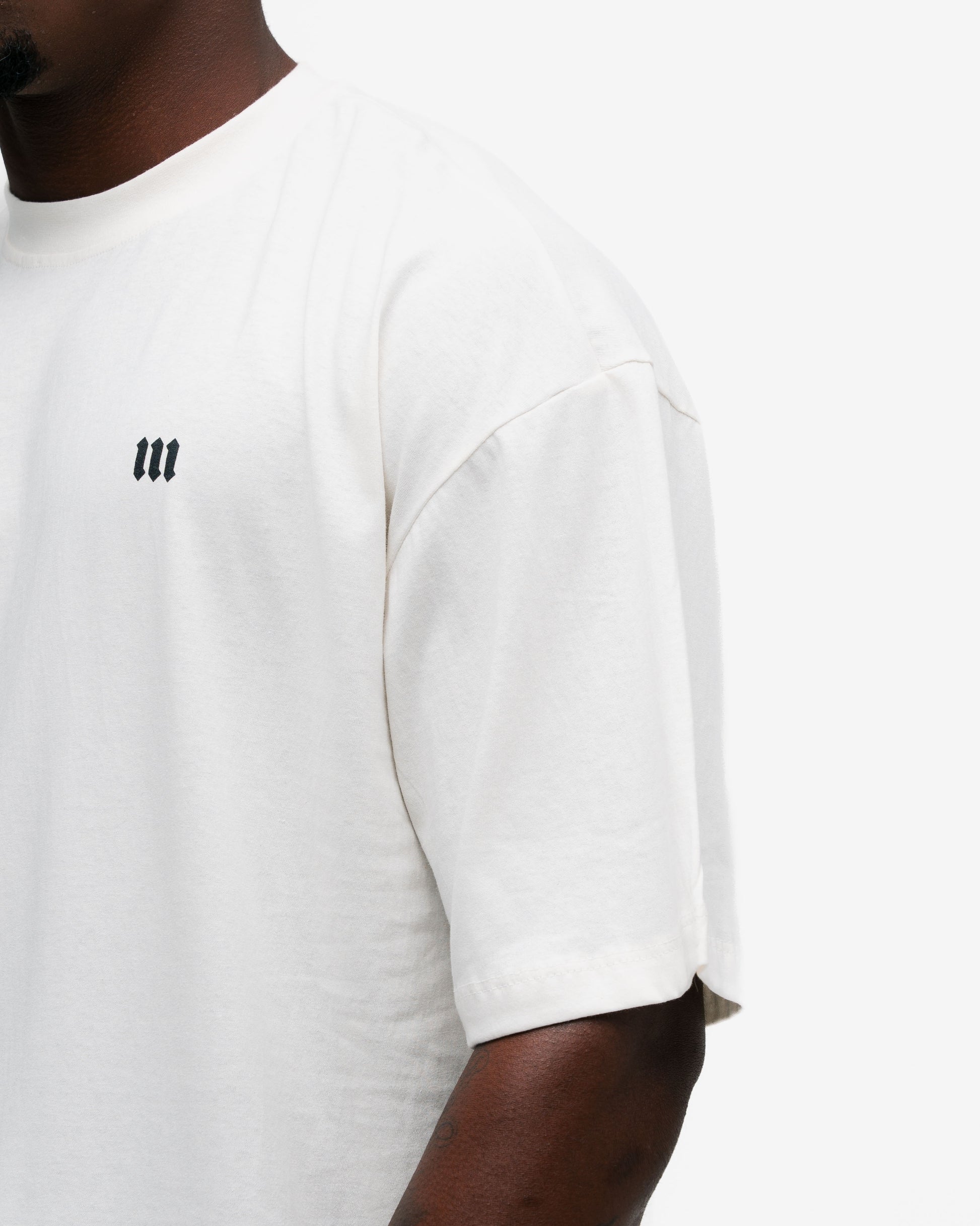Camiseta Oversized Mith Nation Training Club Off White